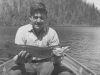 Bob Davisson and the six pound pike he caught in Lake McKenzie. The tackle consisted of a cheap metal rod, hook, and line bought at the local Hudson's Bay store - June 1953.