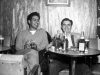 Ed Gonzalez (left) and friend sharing a few beer in the club - October 1953.