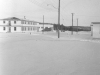 Officers quarters (on left) followed by Motor Pool - January 1953.