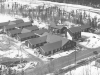 Vacant civilian contractor's facilities. Looking west from the cliff - 29 March 1953.