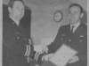 Major Harold Bitcom presents a Merit Award to WO S Eslinger - June 1976