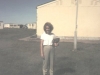 Mme Sinclair in front of school with PMQs in background - 1982