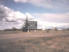 Station sign with Operations site in background - 1985